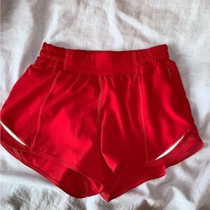 Brand new red lululemon hotty hot shorts, took the tags off, never worn. size 4